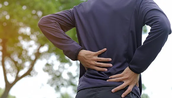 Why Your Back Pain Persists and How Specialists Fix It
